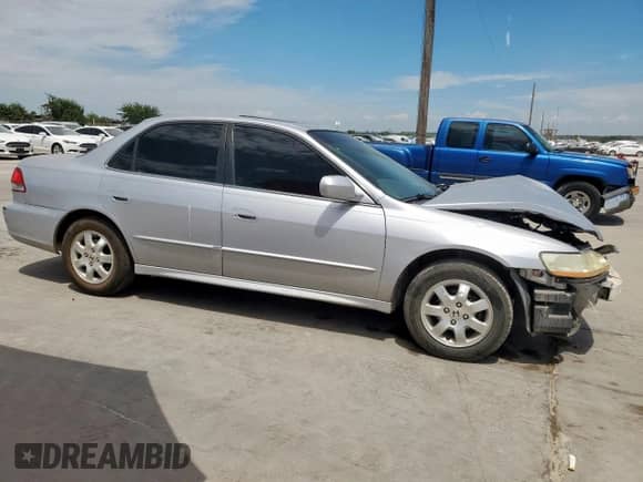 2002 Honda Accord EX with VIN 1HGCG55632A103804, listed as a Copart auction lot 66148865 with Not provided miles and Salvage title. Bid and sale history available at DreamBid. Image 4.