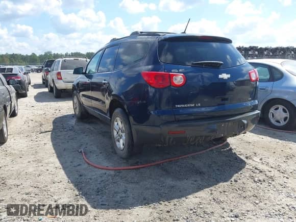 2011 Chevrolet Traverse LS with VIN 1GNKVEED2BJ258981, listed as a IAAI auction lot 43212739 with 166,868 mi miles and . Bid and sale history available at DreamBid. Image 3.