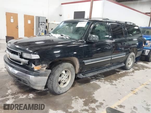 2002 Chevrolet Suburban Z71 with VIN 3GNFK16Z42G305930, listed as a IAAI auction lot 41002347 with 288,355 mi miles and . Bid and sale history available at DreamBid. Image 2.