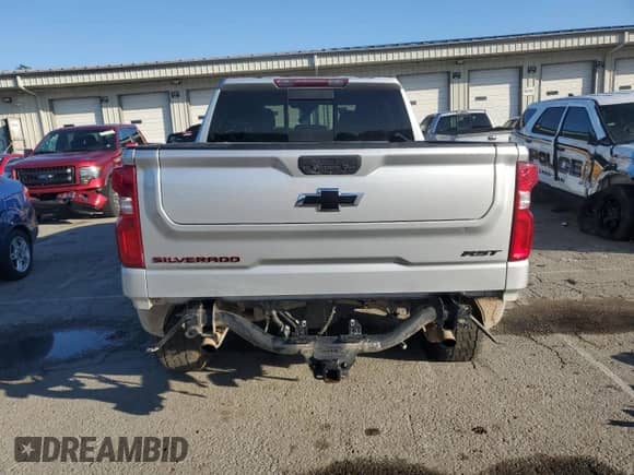 2021 Chevrolet Silverado 1500 RST с VIN 1GCUYEED6MZ357655, выставлен на аукционе Copart как лот 57876095 с пробегом 76 245 миль миль и Списание • Salvage title. История ставок и продаж доступна на DreamBid. Изображение 6.