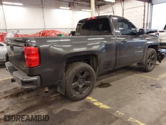 2014 Chevrolet Silverado 1500 Work Truck with VIN 1GCNCPEC7EZ269186, listed as a IAAI auction lot 40896337 with 127,410 mi miles and . Bid and sale history available at DreamBid. Image 4.