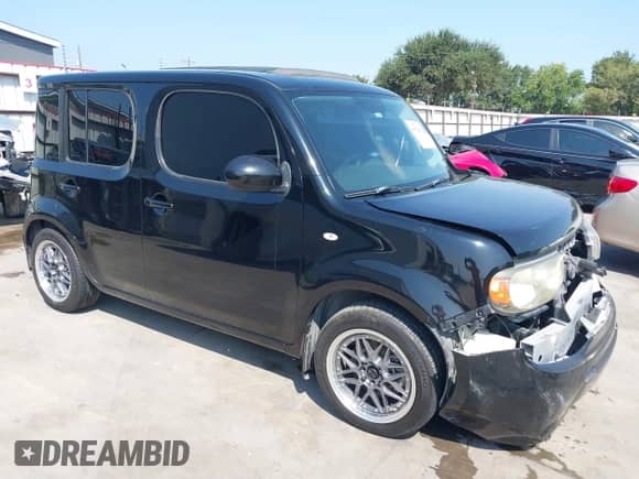 2009 Nissan Cube SL с VIN JN8AZ28R59T127819, выставлен на аукционе IAAI как лот 40032802 с пробегом 138 891 миль миль и . История ставок и продаж доступна на DreamBid. Изображение 1.