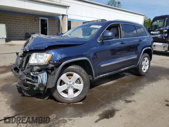 2012 Jeep Grand Cherokee Laredo with VIN 1C4RJFAG6CC197083, listed as a Copart auction lot 65331135 with Not provided miles and Salvage title. Bid and sale history available at DreamBid. Image 1.