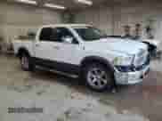 2017 Ram 1500 Laramie with VIN 1C6RR6NT7HS781965, listed as a Copart auction lot 56574875 with 130,209 mi miles and Salvage title. Bid and sale history available at DreamBid. Image 4.