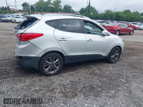 2014 Hyundai Tucson SE with VIN KM8JU3AG5EU831589, listed as a IAAI auction lot 42709097 with 147,199 mi miles and . Bid and sale history available at DreamBid. Image 4.