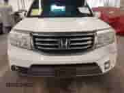 2014 Honda Pilot EX-L with VIN 5FNYF3H57EB013887, listed as a IAAI auction lot 42367443 with 92,431 mi miles and . Bid and sale history available at DreamBid. Image 19.