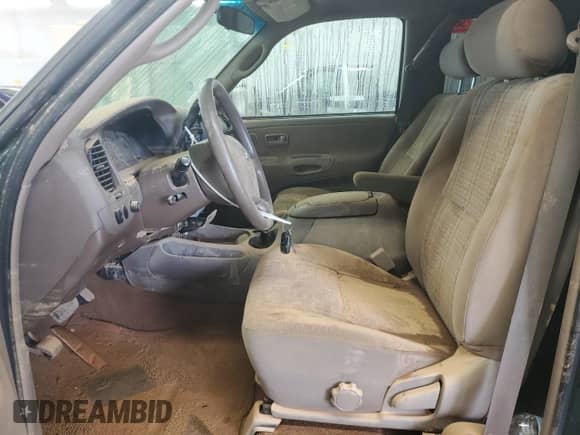 2004 Toyota Tundra SR5 z VIN 5TBBT44194S453071, wystawiony jako Copart lot #61564995 z przebiegiem Nie podano mil oraz Szkoda całkowita • Salvage title. Historia ofert i sprzedaży dostępna na DreamBid. Obrazek 7.