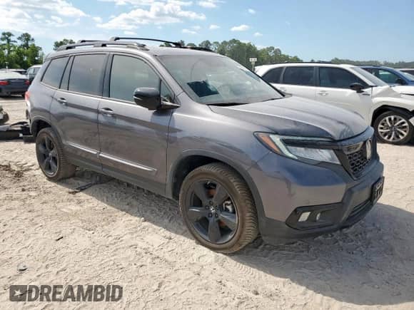 2021 Honda Passport Elite с VIN 5FNYF8H09MB003720, выставлен на аукционе Copart как лот 65995385 с пробегом 27 135 миль миль и Списание • Salvage title. История ставок и продаж доступна на DreamBid. Изображение 4.
