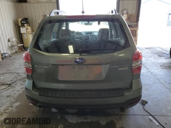 2015 Subaru Forester z VIN SA0123301, wystawiony jako Copart lot #54677574 z przebiegiem 58 430 mil mil oraz Szkoda całkowita • Salvage title. Historia ofert i sprzedaży dostępna na DreamBid. Obrazek 6.