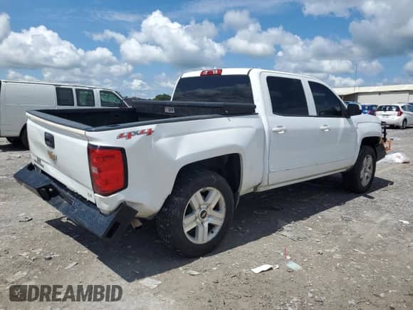 2017 Chevrolet Silverado 1500 LT with VIN 3GCUKREC8HG143580, listed as a Copart auction lot 68869605 with 156,515 mi miles and Salvage title. Bid and sale history available at DreamBid. Image 3.