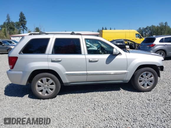 2008 Jeep Grand Cherokee Limited z VIN 1J8HR58238C189595, wystawiony jako IAAI lot #42837942 z przebiegiem 142 538 mil mil oraz . Historia ofert i sprzedaży dostępna na DreamBid. Obrazek 14.