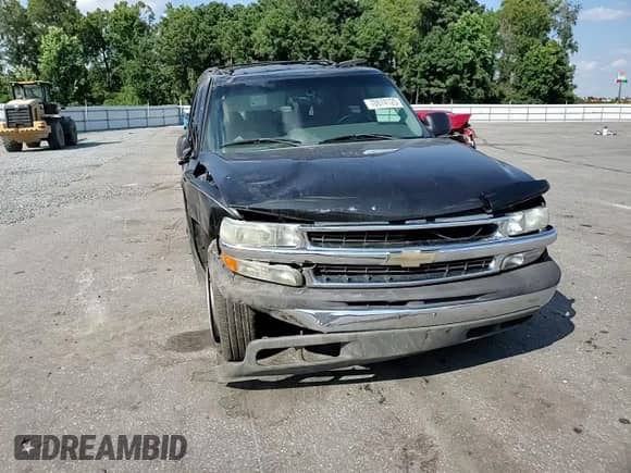 2004 Chevrolet Tahoe LS with VIN 1GNEC13Z94R198759, listed as a Copart auction lot 70674125 with 186,279 mi miles and Salvage title. Bid and sale history available at DreamBid. Image 13.