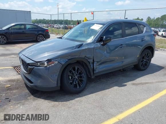 2022 Mazda CX-5 S Preferred z VIN JM3KFBCM9N0584253, wystawiony jako IAAI lot #42142889 z przebiegiem 77 104 mil mil oraz . Historia ofert i sprzedaży dostępna na DreamBid. Obrazek 2.