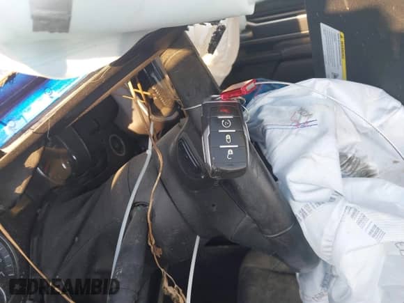 2019 Ram 1500 Big Horn z VIN 1C6RREFT7KN874788, wystawiony jako IAAI lot #43240736 z przebiegiem Nie podano mil oraz . Historia ofert i sprzedaży dostępna na DreamBid. Obrazek 11.