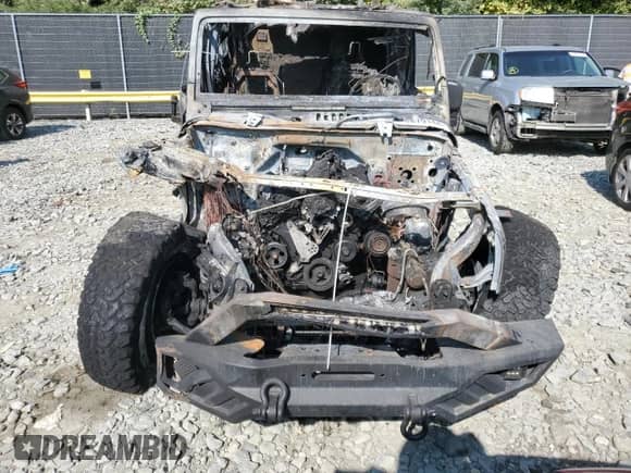 2018 Jeep Wrangler с VIN N0V1N70879144, выставлен на аукционе Copart как лот 70879144 с пробегом Не указан миль и На запчасти • Non repairable. История ставок и продаж доступна на DreamBid. Изображение 5.