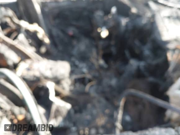 2016 Hyundai Santa Fe z VIN 5XYZTDLB4GG374005, wystawiony jako IAAI lot #42661477 z przebiegiem Nie podano mil oraz . Historia ofert i sprzedaży dostępna na DreamBid. Obrazek 5.