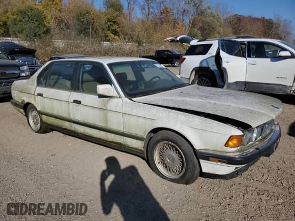 1993 BMW 7 Series with VIN WBAGD832XPDE85801, listed as a Copart auction lot 77111624 with 163,143 mi miles and Clean title. Bid and sale history available at DreamBid. Image 4.