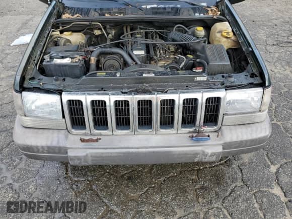 1996 Jeep Grand Cherokee с VIN 1J4EZ58S9TC148692, выставлен на аукционе Copart как лот 87730075 с пробегом Не указан миль и Списание • Salvage title. История ставок и продаж доступна на DreamBid. Изображение 12.