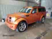 2011 Dodge Nitro Shock z VIN 1D4PU7GX8BW590952, wystawiony jako Copart lot #64893755 z przebiegiem 135 449 mil mil oraz Szkoda całkowita • Salvage title. Historia ofert i sprzedaży dostępna na DreamBid. Obrazek 1.