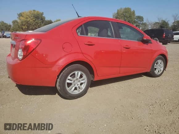 2013 Chevrolet Sonic LT with VIN 1G1JC5SH2D4129313, listed as a Copart auction lot 84061735 with 42,688 mi miles and Salvage title. Bid and sale history available at DreamBid. Image 3.