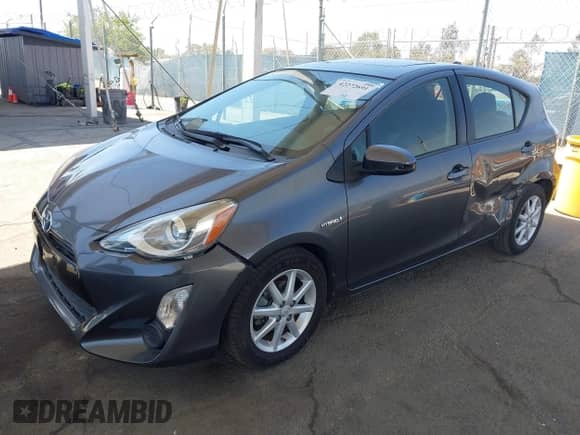 2015 Toyota Prius One z VIN JTDKDTB3XF1097121, wystawiony jako IAAI lot #42272691 z przebiegiem 124 485 mil mil oraz . Historia ofert i sprzedaży dostępna na DreamBid. Obrazek 2.