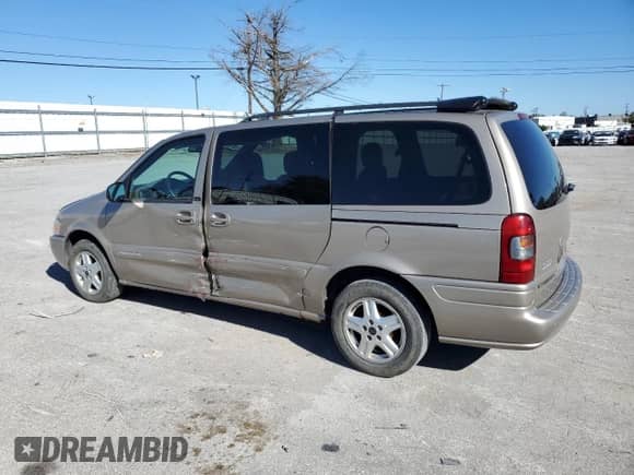 2004 Chevrolet Venture LT with VIN 1GNDX13E74D105294, listed as a Copart auction lot 74743294 with 111,928 mi miles and Salvage title. Bid and sale history available at DreamBid. Image 2.