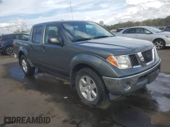 2007 Nissan Frontier LE with VIN 1N6AD07W27C437765, listed as a Copart auction lot 84877525 with 273,166 mi miles and Salvage title. Bid and sale history available at DreamBid. Image 4.