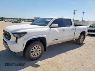 2024 Toyota Tacoma SR5 with VIN 3TMKB5FN5RM001898, listed as a Copart auction lot 70905105 with 6,438 mi miles and Salvage title. Bid and sale history available at DreamBid. Image 1.