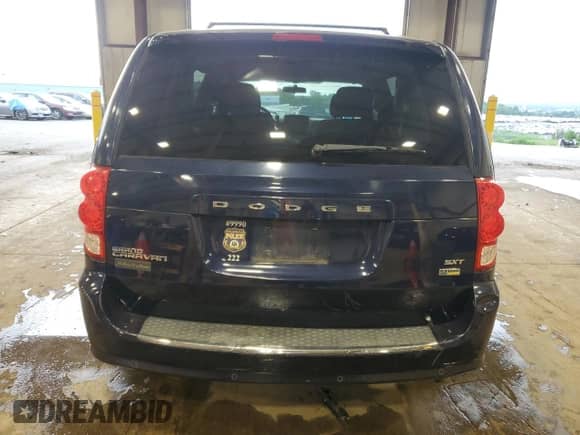 2014 Dodge Grand Caravan SXT 30th Anniversary with VIN 2C4RDGCG5ER290133, listed as a Copart auction lot 63633255 with 132,598 mi miles and Salvage title. Bid and sale history available at DreamBid. Image 6.