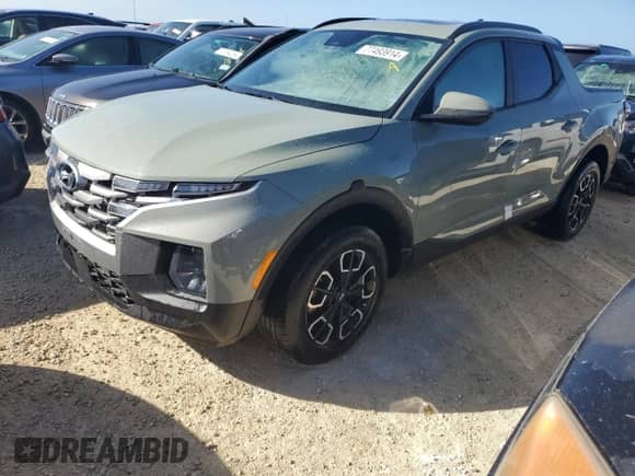 2023 Hyundai Santa Cruz SEL Premium z VIN 5NTJDDAF6PH057322, wystawiony jako Copart lot #77493914 z przebiegiem 21 615 mil mil oraz Nie do naprawy • Non repairable. Historia ofert i sprzedaży dostępna na DreamBid. Obrazek 1.