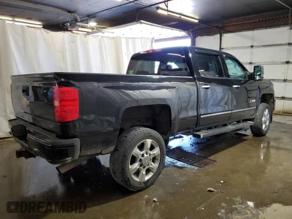 2017 Chevrolet Silverado 2500HD LTZ с VIN 1GC1KWEG2HF175057, выставлен на аукционе Copart как лот 85135505 с пробегом 136 887 миль миль и Списание • Salvage title. История ставок и продаж доступна на DreamBid. Изображение 3.