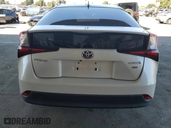 2019 Toyota Prius L Eco с VIN JTDKARFUXK3101195, выставлен на аукционе Copart как лот 82488755 с пробегом 37 486 миль миль и Списание • Salvage title. История ставок и продаж доступна на DreamBid. Изображение 6.