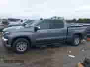 2021 Chevrolet Silverado 1500 LT with VIN 1GCPWCEDXMZ149169, listed as a IAAI auction lot 43350821 with 83,296 mi miles and . Bid and sale history available at DreamBid. Image 14.