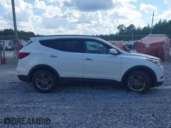 2017 Hyundai Santa Fe 2.4L z VIN 5NMZUDLBXHH027377, wystawiony jako IAAI lot #43341936 z przebiegiem 94 975 mil mil oraz . Historia ofert i sprzedaży dostępna na DreamBid. Obrazek 13.