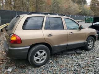 2001 Hyundai Santa Fe GLS с VIN KM8SC83D71U084837, выставлен на аукционе Copart как лот 77588984 с пробегом 102 585 миль миль и Списание • Salvage title. История ставок и продаж доступна на DreamBid. Изображение 3.