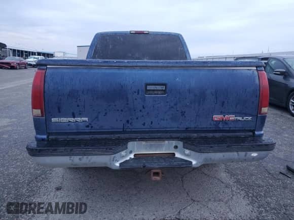 1995 GMC Sierra 1500 z VIN 2GTEC19K0S1537997, wystawiony jako Copart lot #85018174 z przebiegiem 240 831 mil mil oraz Czysty tytuł • Clean title. Historia ofert i sprzedaży dostępna na DreamBid. Obrazek 6.