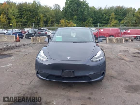 2022 Tesla Model Y Long Range z VIN 7SAYGDEE9NA018029, wystawiony jako IAAI lot #43211378 z przebiegiem 59 492 mil mil oraz . Historia ofert i sprzedaży dostępna na DreamBid. Obrazek 13.