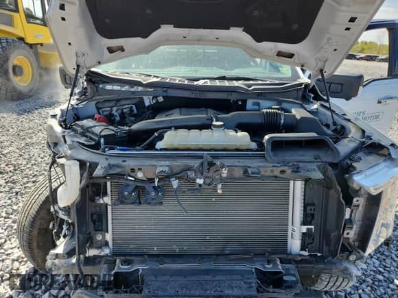 2022 Ford F-150 XL z VIN 1FTFX1E88NFC22882, wystawiony jako Copart lot #80175745 z przebiegiem 76 818 mil mil oraz Szkoda całkowita • Salvage title. Historia ofert i sprzedaży dostępna na DreamBid. Obrazek 11.