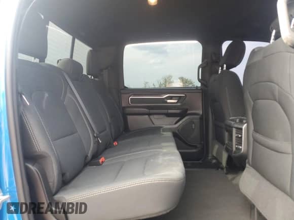 2021 Ram 1500 Big Horn z VIN 1C6RREFT7MN584389, wystawiony jako Copart lot #56168795 z przebiegiem 61 604 mil mil oraz Nie do naprawy • Non repairable. Historia ofert i sprzedaży dostępna na DreamBid. Obrazek 10.