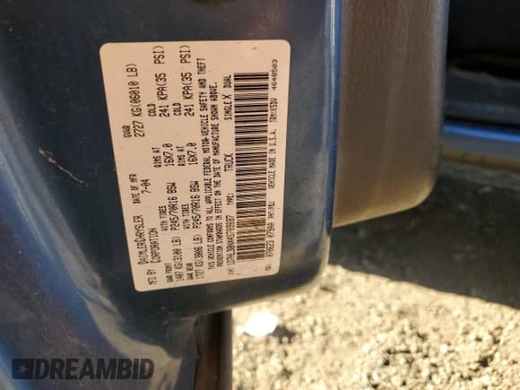 2004 Dodge Dakota Sport z VIN 1D7HL38NX4S789687, wystawiony jako Copart lot #77435824 z przebiegiem 157 993 mil mil oraz Szkoda całkowita • Salvage title. Historia ofert i sprzedaży dostępna na DreamBid. Obrazek 14.