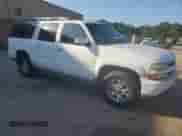 2002 Chevrolet Suburban Z71 с VIN 3GNFK16ZX2G216704, выставлен на аукционе Copart как лот 82005935 с пробегом 296 826 миль миль и Списание • Salvage title. История ставок и продаж доступна на DreamBid. Изображение 4.