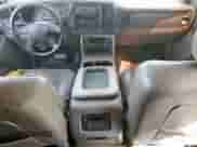 2004 Chevrolet Tahoe LT с VIN 1GNEC13Z44R308049, выставлен на аукционе Copart как лот 85307235 с пробегом 215 108 миль миль и Списание • Salvage title. История ставок и продаж доступна на DreamBid. Изображение 8.