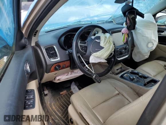 2014 Dodge Durango Limited with VIN 1C4RDHDG8EC443410, listed as a Copart auction lot 61386365 with 115,570 mi miles and Salvage title. Bid and sale history available at DreamBid. Image 8.