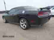 2013 Dodge Challenger R/T with VIN 2C3CDYBTXDH653559, listed as a IAAI auction lot 42304148 with 84,796 mi miles and . Bid and sale history available at DreamBid. Image 3.