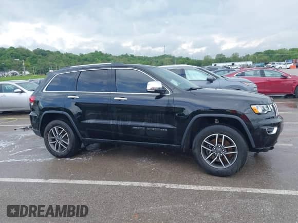 2021 Jeep Grand Cherokee 80th Anniversary with VIN 1C4RJFBG2MC776068, listed as a IAAI auction lot 42142376 with 50,419 mi miles and . Bid and sale history available at DreamBid. Image 14.