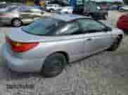 2001 Saturn SC with VIN 1G8ZP12851Z215716, listed as a Copart auction lot 69665754 with Not provided miles and Salvage title. Bid and sale history available at DreamBid. Image 3.