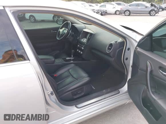 2014 Nissan Maxima SV with VIN 1N4AA5AP2EC472108, listed as a IAAI auction lot 43356452 with 144,998 mi miles and . Bid and sale history available at DreamBid. Image 5.