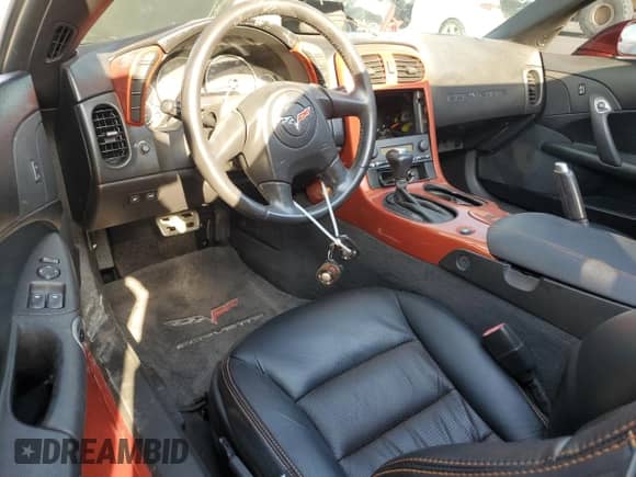 2005 Chevrolet Corvette with VIN 1G1YY24U655127956, listed as a Copart auction lot 72440104 with Not provided miles and Salvage title. Bid and sale history available at DreamBid. Image 8.