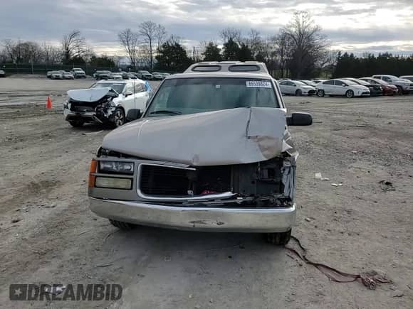 1998 GMC Sierra 1500 z VIN 1GTEC14W0WZ526005, wystawiony jako Copart lot #86539824 z przebiegiem 206 094 mil mil oraz Czysty tytuł • Clean title. Historia ofert i sprzedaży dostępna na DreamBid. Obrazek 11.