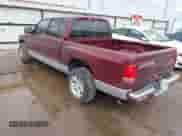 2001 Dodge Dakota Sport with VIN 1B7HL2AN11S318912, listed as a IAAI auction lot 42101199 with 128,006 mi miles and . Bid and sale history available at DreamBid. Image 3.